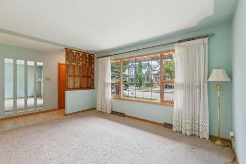 47 Montrose Crescent Ne, Calgary, AB - Indoor Photo Showing Other Room