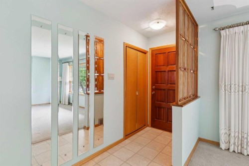 47 Montrose Crescent Ne, Calgary, AB - Indoor Photo Showing Other Room