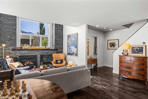 3-601 4, Canmore, AB - Indoor Photo Showing Living Room With Fireplace