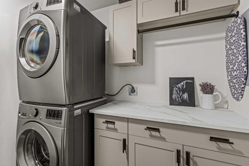 3-601 4, Canmore, AB - Indoor Photo Showing Laundry Room