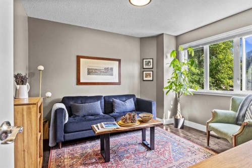 3-601 4, Canmore, AB - Indoor Photo Showing Living Room