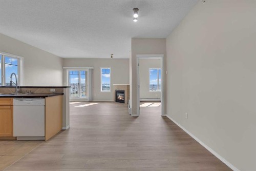 6307-70 Panamount Drive Nw, Calgary, AB - Indoor With Fireplace