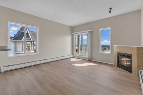 6307-70 Panamount Drive Nw, Calgary, AB - Indoor With Fireplace
