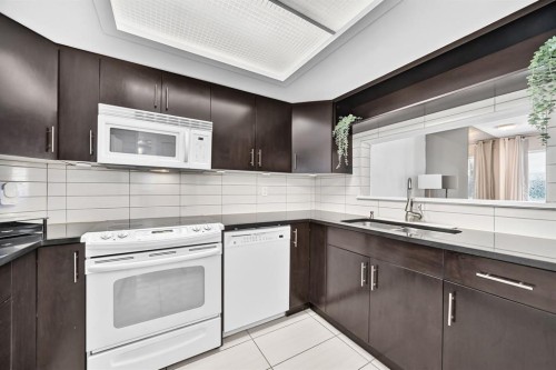 307-3717 42 Street Nw, Calgary, AB - Indoor Photo Showing Kitchen
