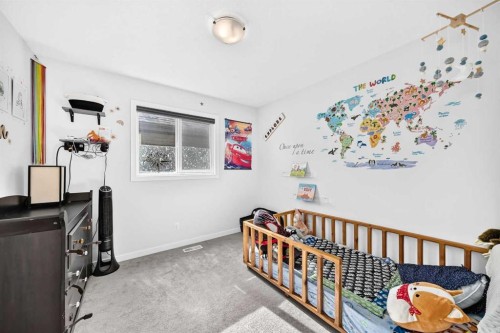 16 Sunrise Crescent, Cochrane, AB - Indoor Photo Showing Other Room