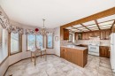 183 Christie Park Hill Sw, Calgary, AB  - Indoor Photo Showing Kitchen With Double Sink 