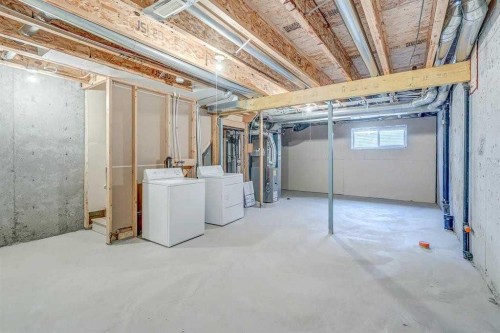 2520 Eversyde Avenue Sw, Calgary, AB - Indoor Photo Showing Laundry Room