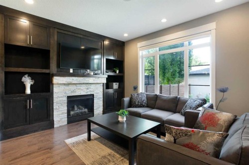434 22 Avenue Nw, Calgary, AB - Indoor Photo Showing Living Room With Fireplace