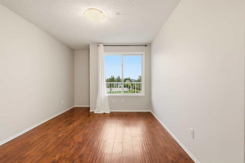 2323-700 Willowbrook Road Nw, Airdrie, AB - Indoor Photo Showing Other Room