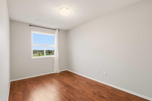 2323-700 Willowbrook Road Nw, Airdrie, AB - Indoor Photo Showing Other Room