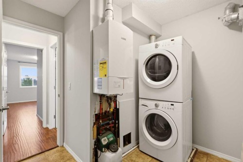 2323-700 Willowbrook Road Nw, Airdrie, AB - Indoor Photo Showing Laundry Room
