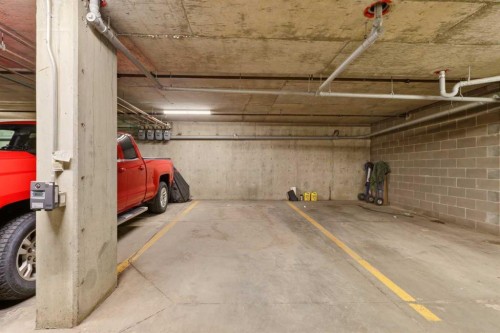2323-700 Willowbrook Road Nw, Airdrie, AB - Indoor Photo Showing Garage