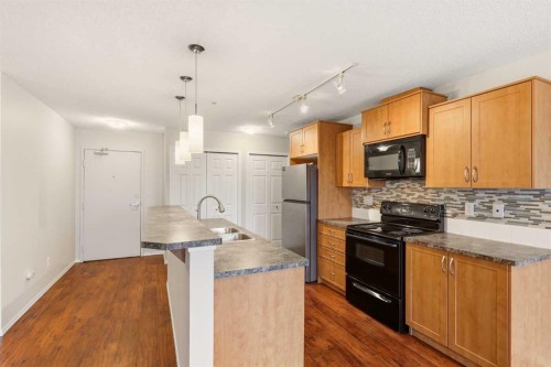 2323-700 Willowbrook Road Nw, Airdrie, AB - Indoor Photo Showing Kitchen