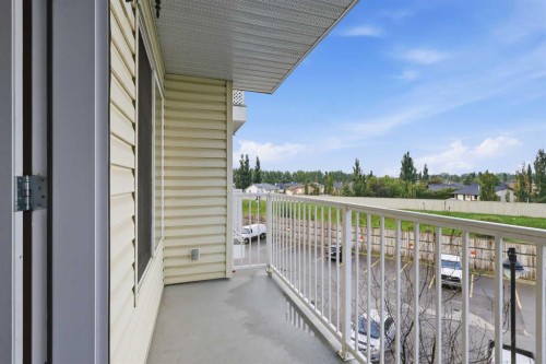 2323-700 Willowbrook Road Nw, Airdrie, AB - Outdoor With Balcony With Exterior