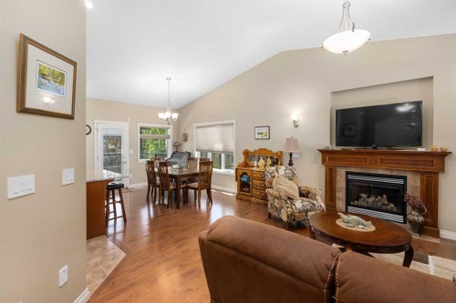 24 Vermont Close, Olds, AB - Indoor Photo Showing Living Room With Fireplace
