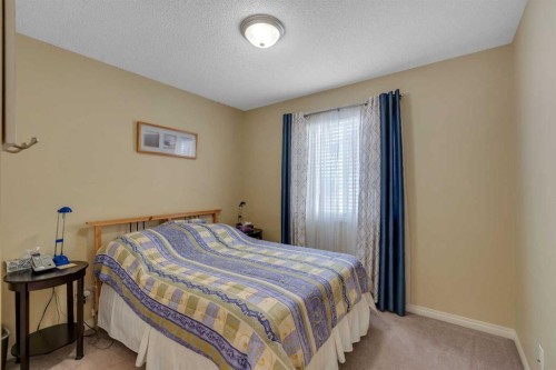 105 West Creek Pond, Chestermere, AB - Indoor Photo Showing Bedroom