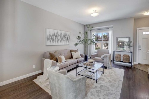 249 Ranch Ridge Meadow, Strathmore, AB - Indoor Photo Showing Living Room