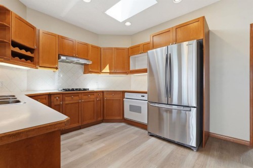 412 Harrison Court, Crossfield, AB - Indoor Photo Showing Kitchen With Double Sink
