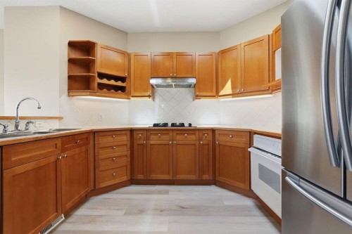 412 Harrison Court, Crossfield, AB - Indoor Photo Showing Kitchen