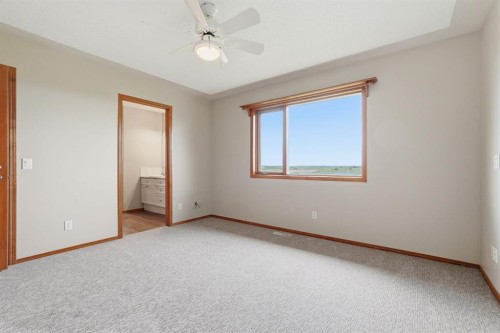 412 Harrison Court, Crossfield, AB - Indoor Photo Showing Other Room