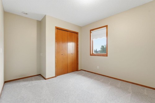 412 Harrison Court, Crossfield, AB - Indoor Photo Showing Other Room