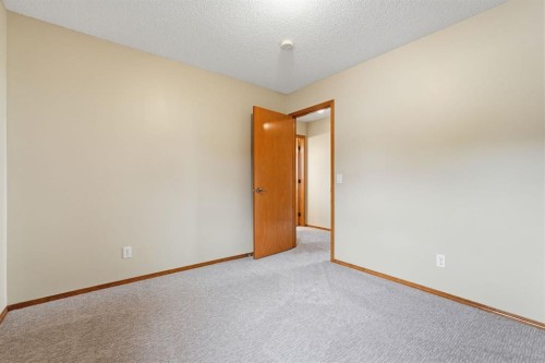 412 Harrison Court, Crossfield, AB - Indoor Photo Showing Other Room