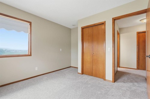 412 Harrison Court, Crossfield, AB - Indoor Photo Showing Other Room