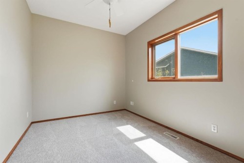412 Harrison Court, Crossfield, AB - Indoor Photo Showing Other Room