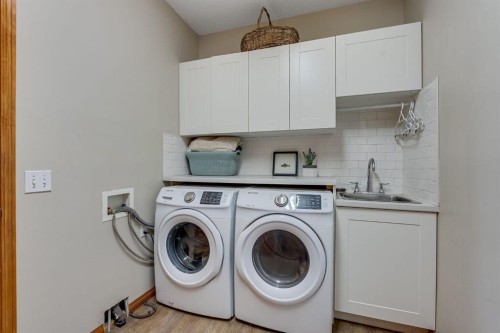412 Harrison Court, Crossfield, AB - Indoor Photo Showing Laundry Room