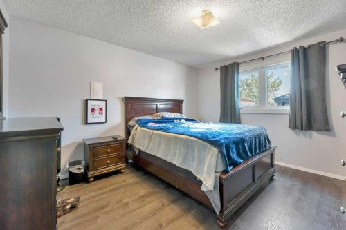 23 Abbercove Road Se, Calgary, AB - Indoor Photo Showing Bedroom