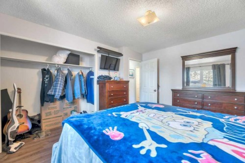 23 Abbercove Road Se, Calgary, AB - Indoor Photo Showing Bedroom