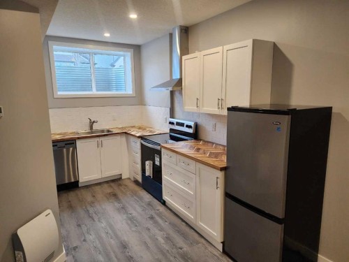 96 Wolf Gate, Okotoks, AB 