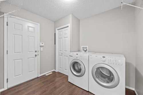 140 West Creek Circle, Chestermere, AB - Indoor Photo Showing Laundry Room
