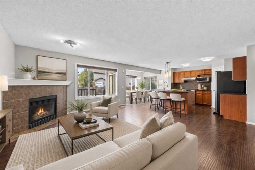 140 West Creek Circle, Chestermere, AB - Indoor Photo Showing Living Room With Fireplace