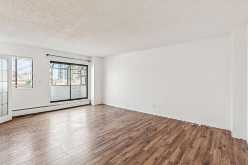 711-111 14 Avenue Se, Calgary, AB - Indoor Photo Showing Other Room