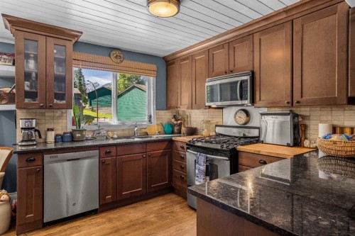 246 Kluane Drive, Banff, AB - Indoor Photo Showing Kitchen With Stainless Steel Kitchen