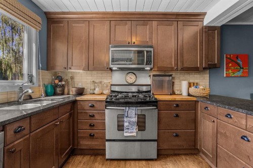 246 Kluane Drive, Banff, AB - Indoor Photo Showing Kitchen With Double Sink
