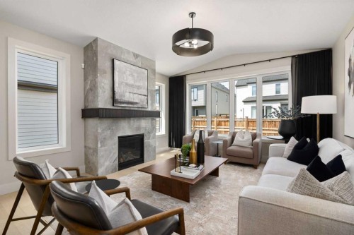 364 Greenwich Drive Nw, Calgary, AB - Indoor Photo Showing Living Room With Fireplace