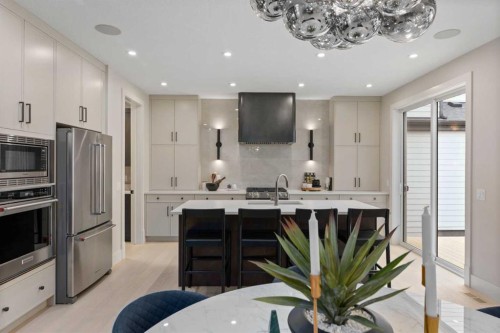 364 Greenwich Drive Nw, Calgary, AB - Indoor Photo Showing Kitchen With Upgraded Kitchen