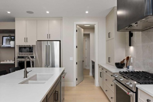 364 Greenwich Drive Nw, Calgary, AB - Indoor Photo Showing Kitchen With Double Sink With Upgraded Kitchen