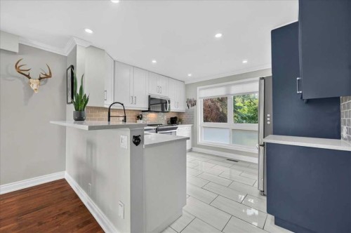 756 Strathcona Drive Sw, Calgary, AB - Indoor Photo Showing Kitchen