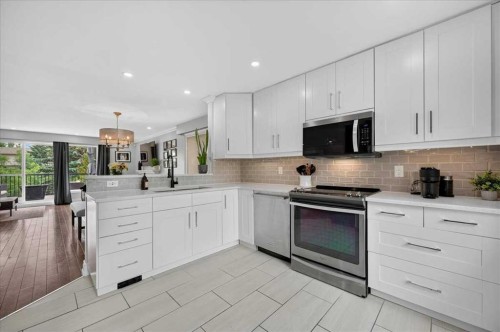 756 Strathcona Drive Sw, Calgary, AB - Indoor Photo Showing Kitchen With Upgraded Kitchen