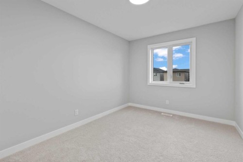343 Belvedere Drive Se, Calgary, AB - Indoor Photo Showing Other Room