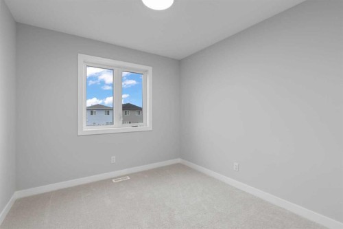 343 Belvedere Drive Se, Calgary, AB - Indoor Photo Showing Other Room