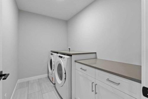 343 Belvedere Drive Se, Calgary, AB - Indoor Photo Showing Laundry Room
