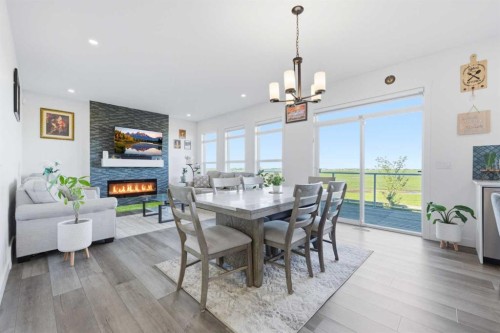 109 Homestead Crescent Ne, Calgary, AB - Indoor Photo Showing Dining Room With Fireplace