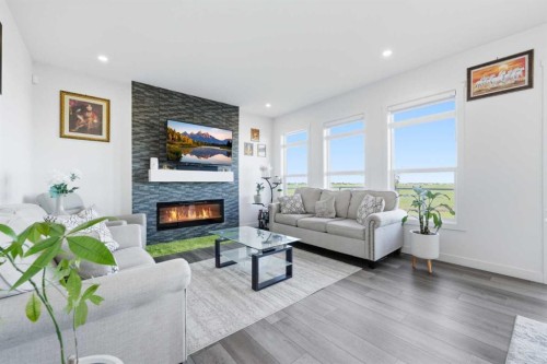 109 Homestead Crescent Ne, Calgary, AB - Indoor Photo Showing Living Room With Fireplace