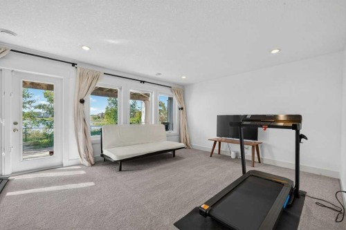 232 Copperpond Circle Se, Calgary, AB - Indoor Photo Showing Gym Room