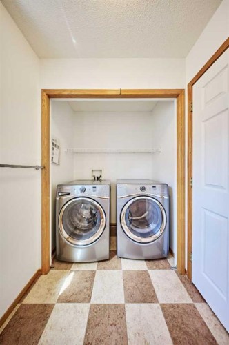 9683 Hidden Valley Drive Nw, Calgary, AB - Indoor Photo Showing Laundry Room