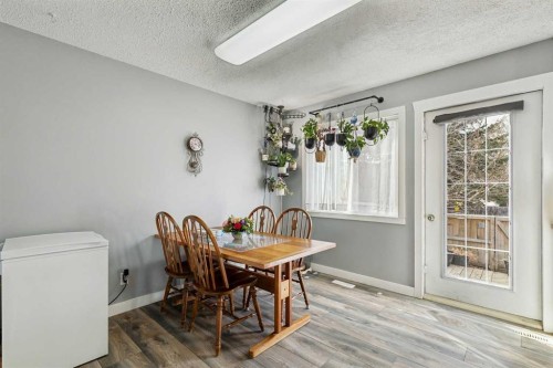 113-107 Elm Place, Okotoks, AB - Indoor Photo Showing Dining Room
